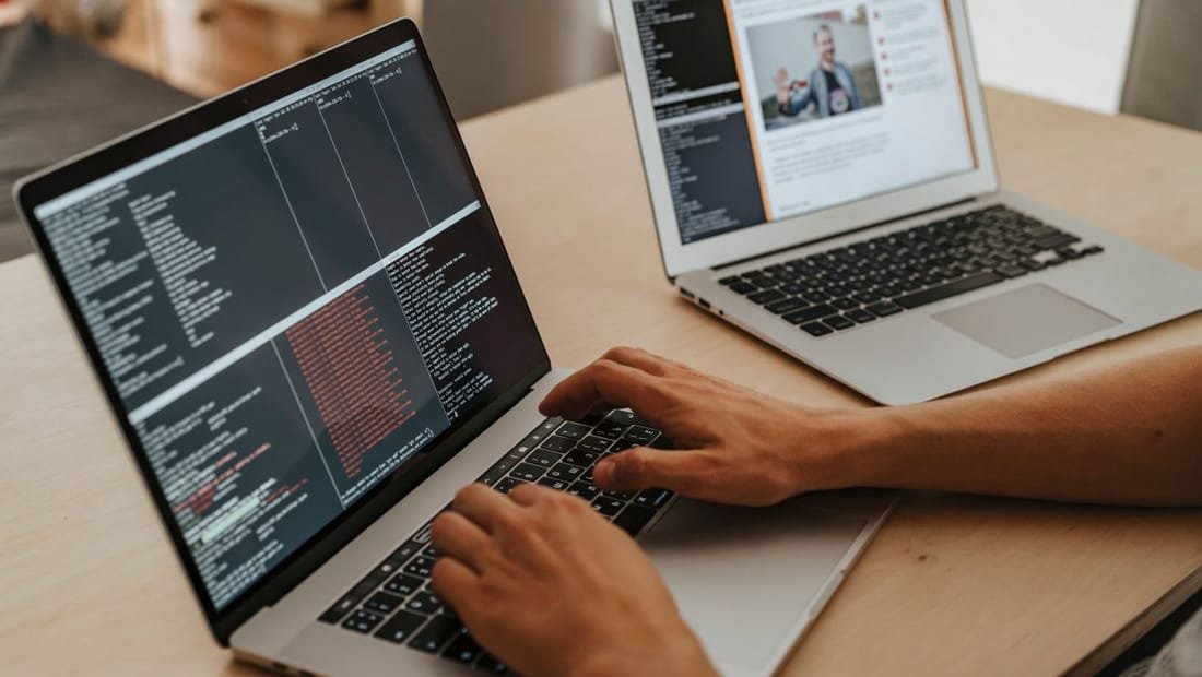Agent updating their business profile on a computer