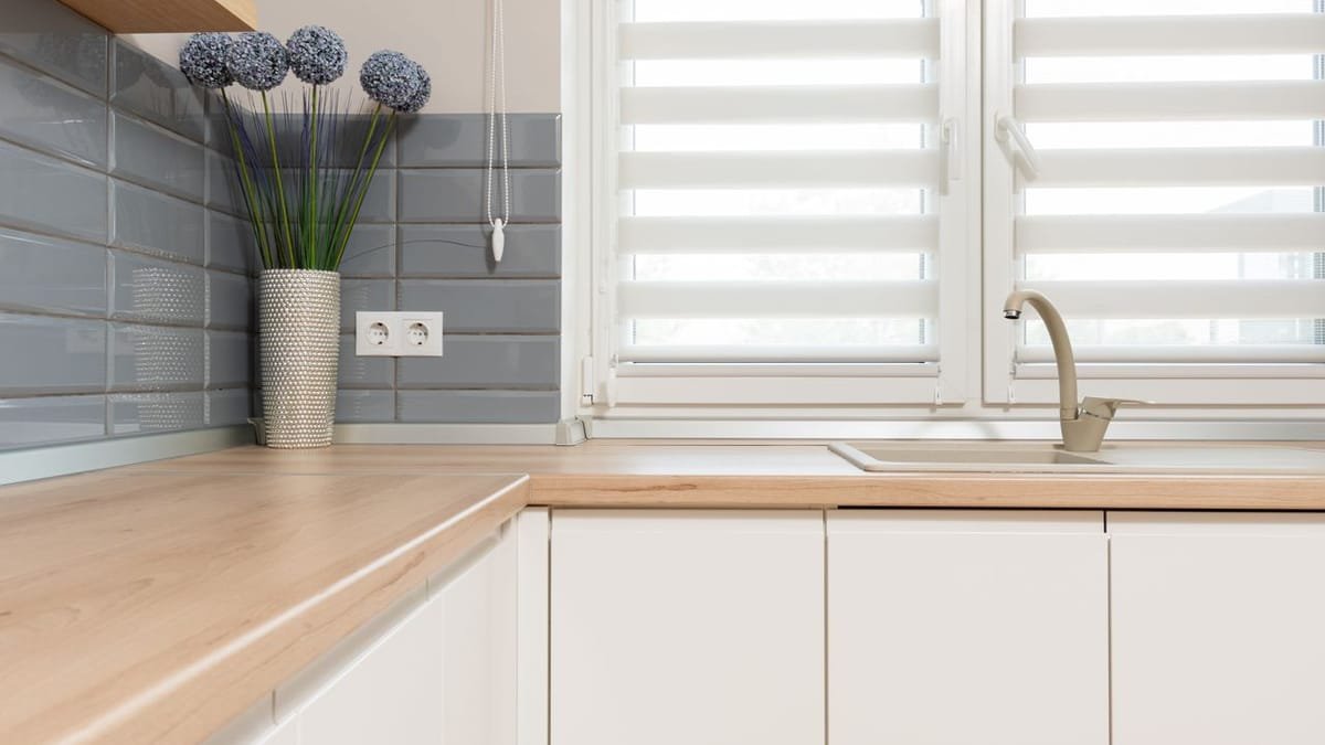 Detail of a modern kitchen in a property listing