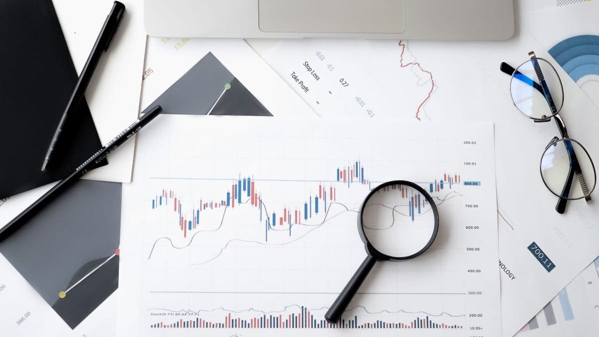 SEO analytics chart viewed through a magnifying glass