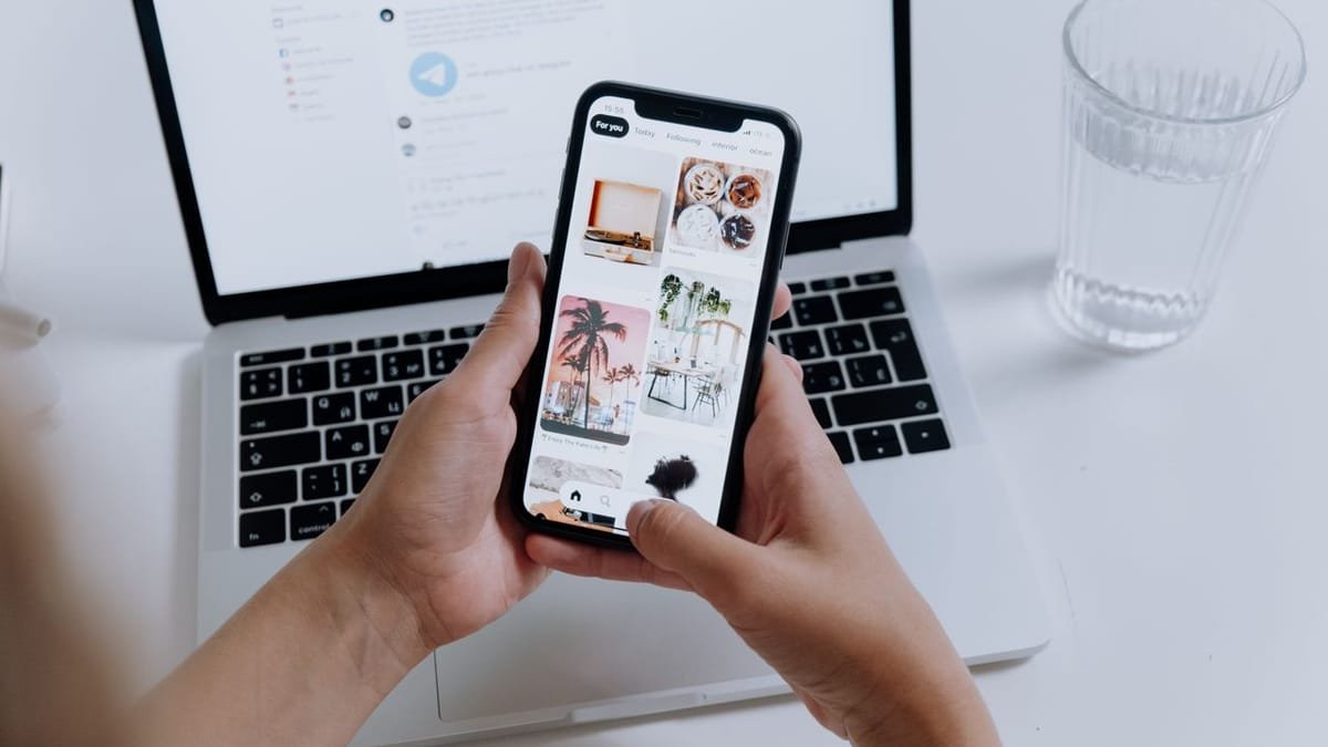Scrolling a real estate social media feed on a phone